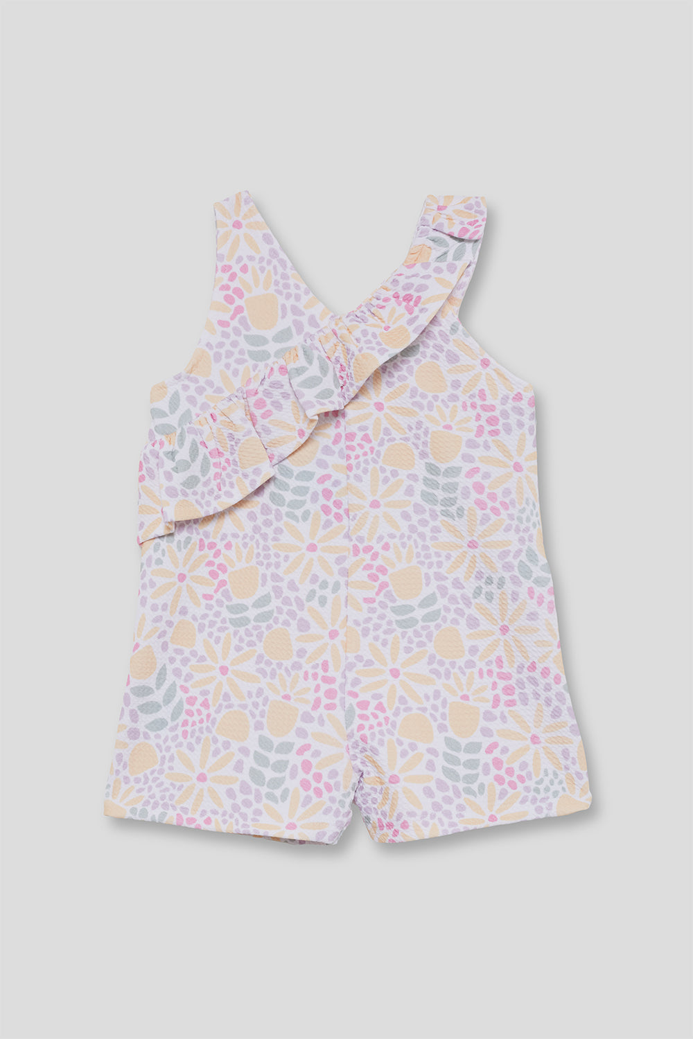 Mono niña estampado con volante en el pecho