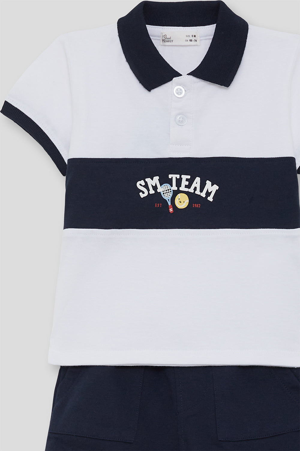 Conjunto niño polo blanco y marino con short a juego